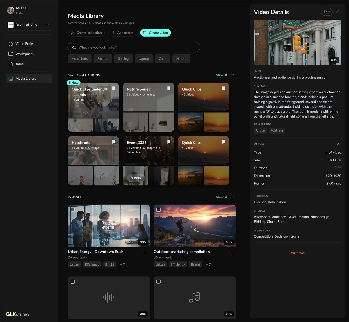 GLX video details panel showing automatic AI analysis of one clip: emotions (Focused, Anticipation), literal objects (auctioneer, gavel, podium, bidding), and metaphors (Competition, Decision-making)